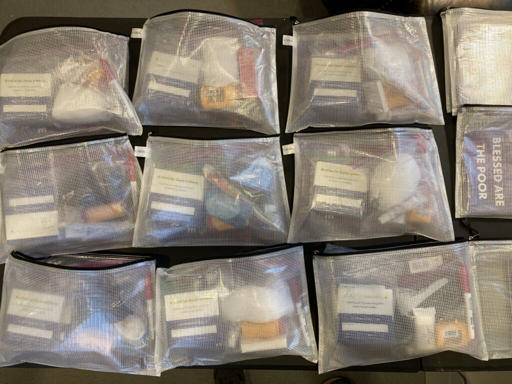 A table of Pursuit Packs in clear zip bags